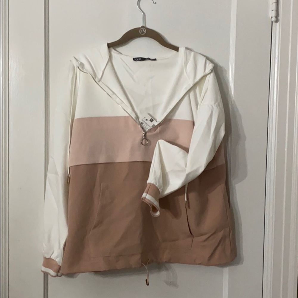 Wind breaker jacket with hood